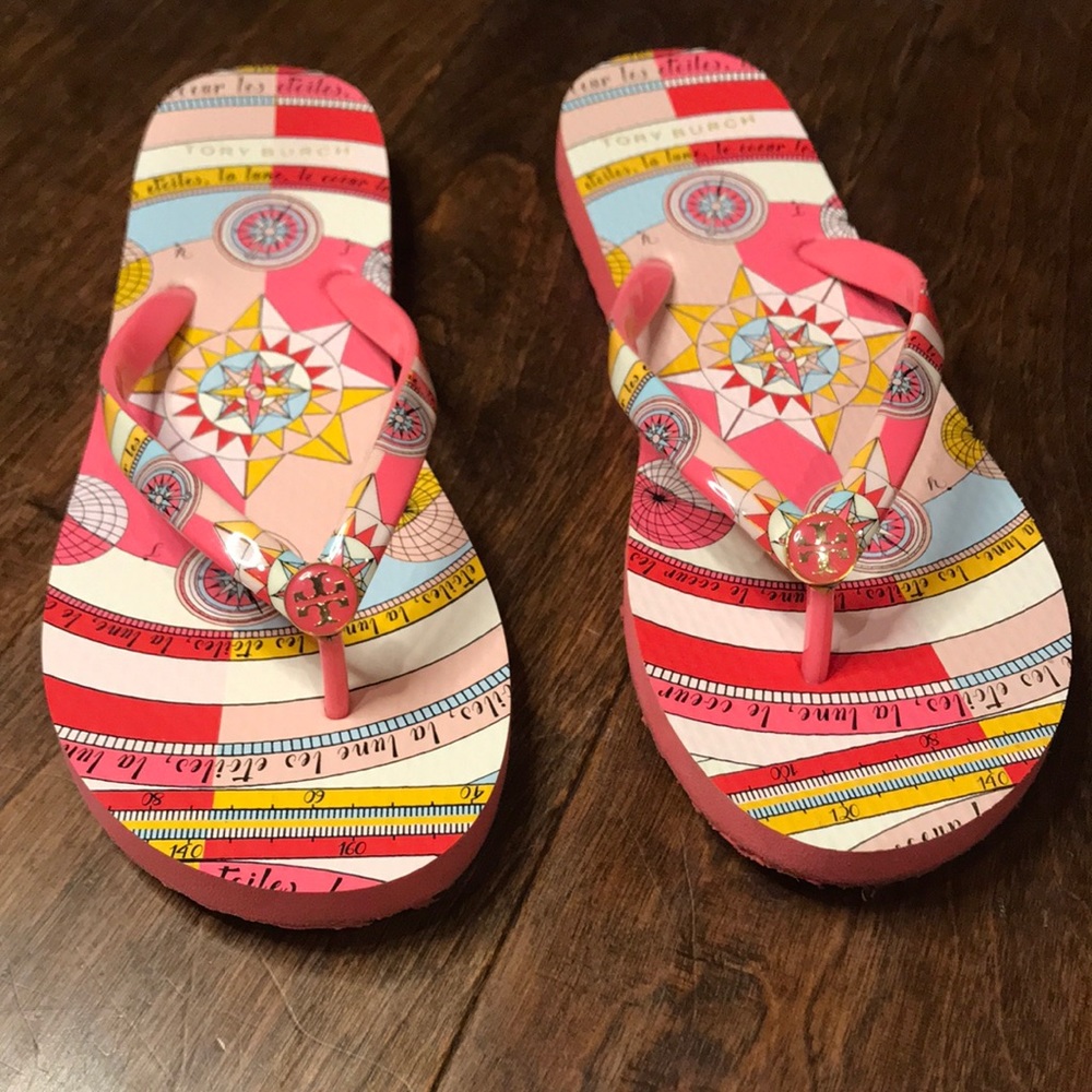 Tory Burch pink constellation flip flops, size 7